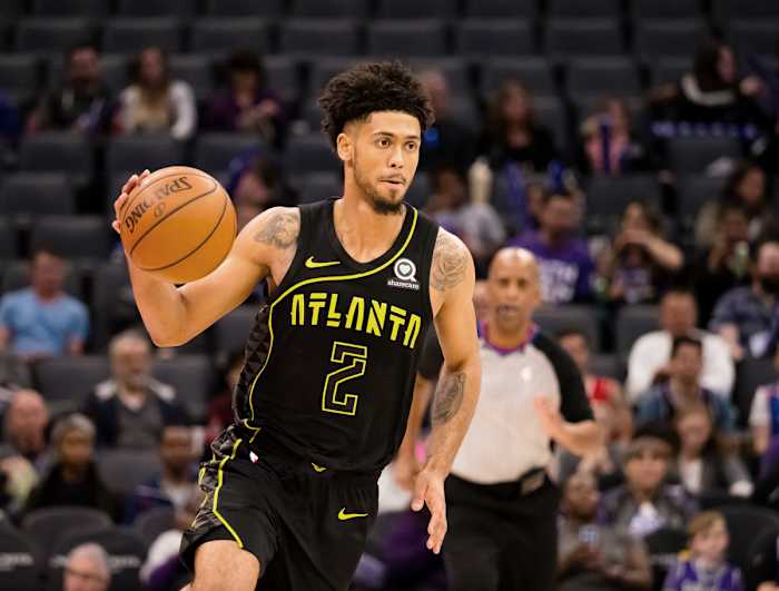 Mar 22, 2018; Sacramento, CA, USA; Atlanta Hawks guard Tyler Dorsey (2) controls the ball against the Sacramento Kings during the third quater at Golden 1 Center.